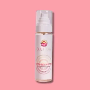 Tanning Water with color correcting additives to even skin tone