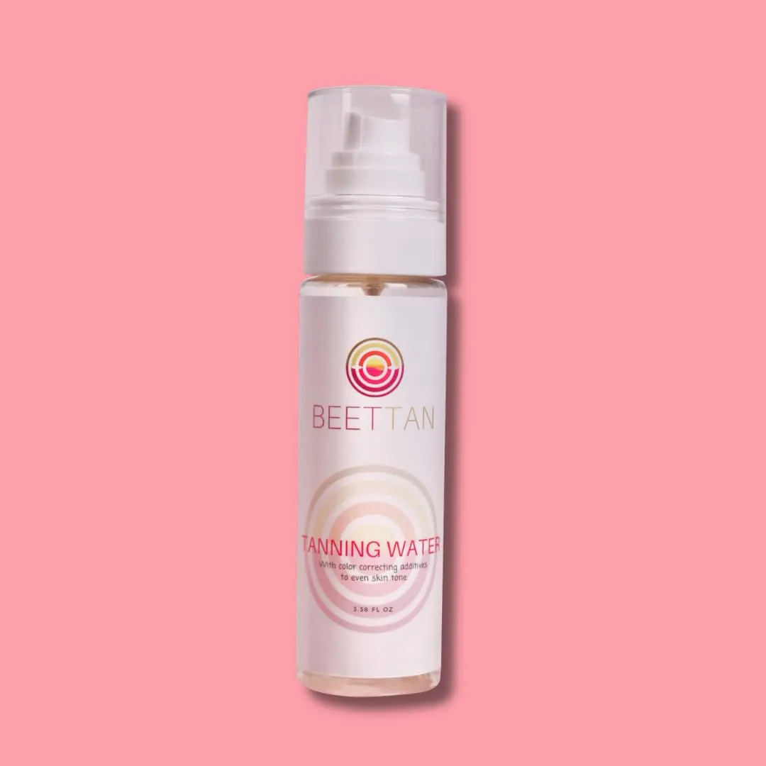 Tanning Water with color correcting additives to even skin tone
